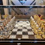 Detail of the velvet-finished base and royal blue velvet storage box of the crystal chess set