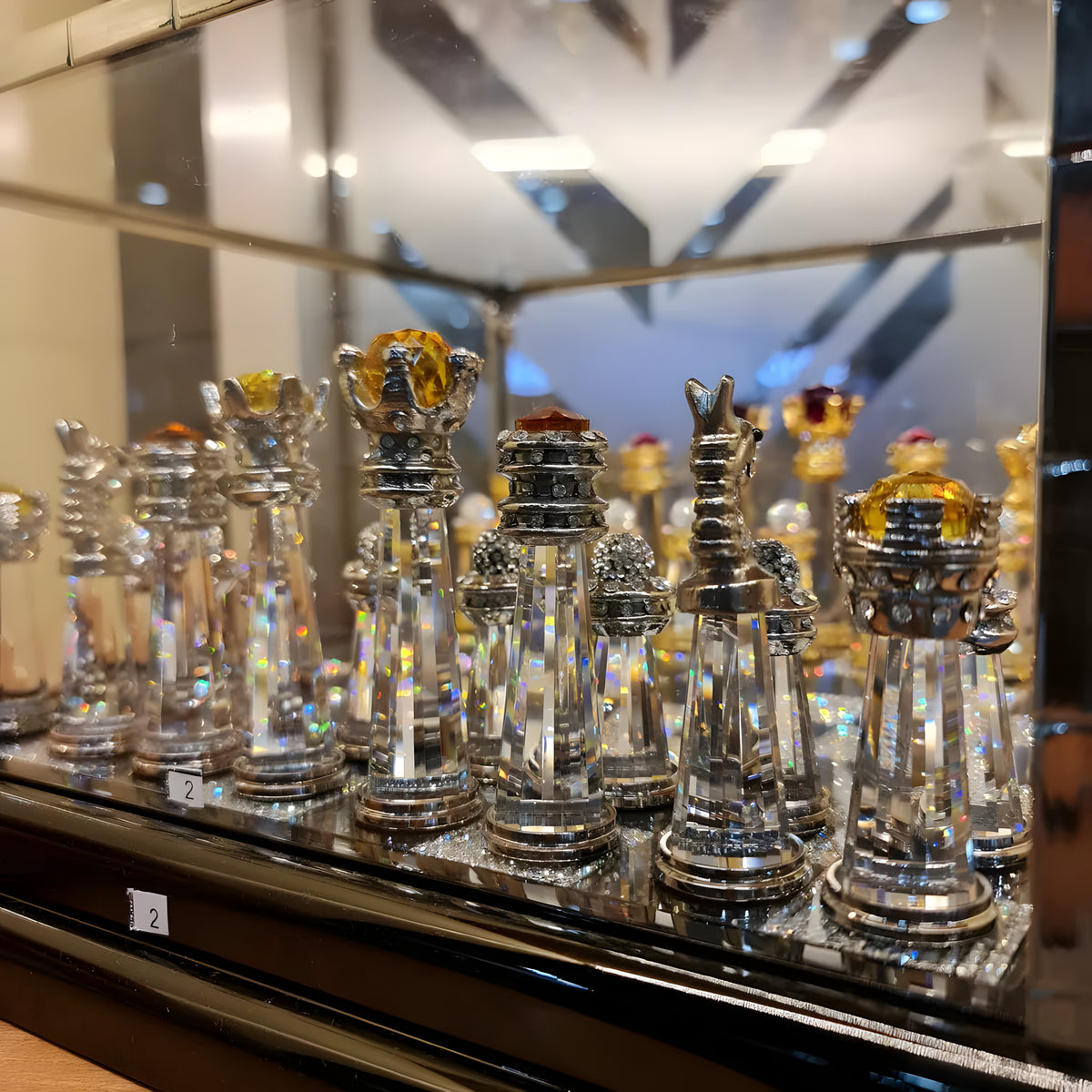 Crystal chess pieces catching the light with brilliant sparkle