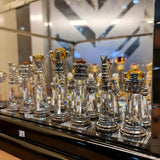Crystal chess pieces catching the light with brilliant sparkle