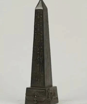 Ancient Egyptian Obelisk of Ramses II with the scarab and sphinx