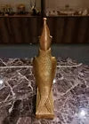 Back view of the Golden Horus falcon statue, museum reproduction