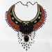 Close-up of the winged scarab centerpiece on the handmade Egyptian collar necklace