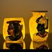 Close-up of the alabaster Osiris vase showing hand-painted detail, museum reproduction