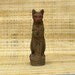 Side profile view of the handmade Bastet statue museum reproduction