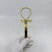 Brass Ankh of Maat pendant museum reproduction, back view