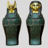 Egyptian winged sun canopic jars set, museum reproduction — full set view for scale