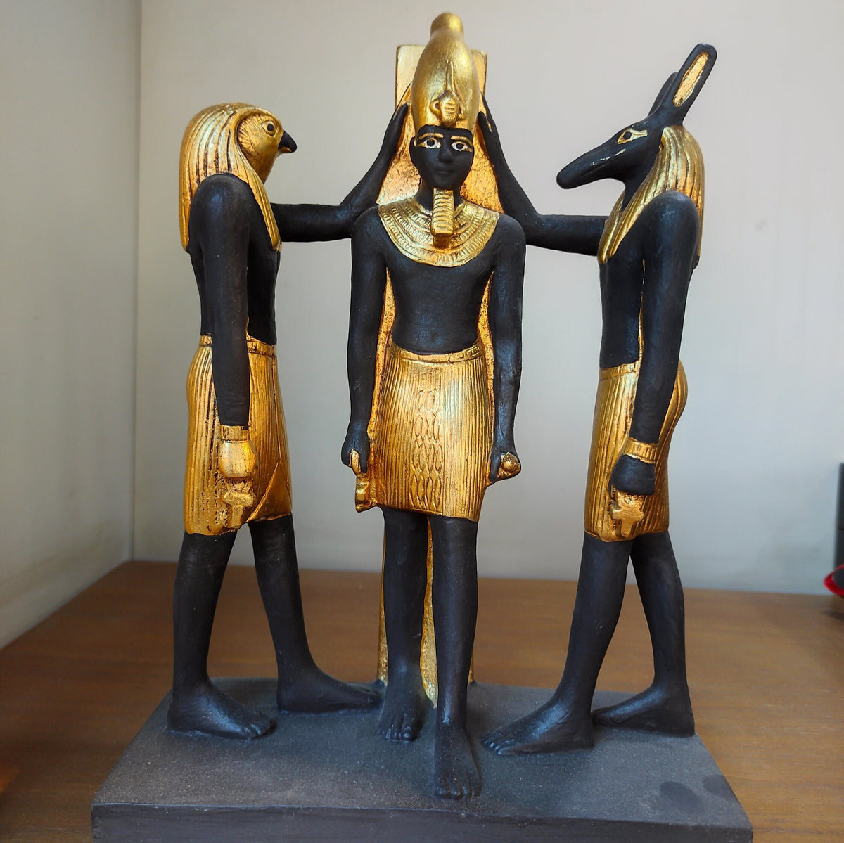 Black and gold Ramesses III with Horus and Seth museum reproduction, front view