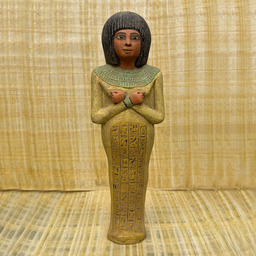 Egyptian Isis goddess statue, museum reproduction — front view of the hand-carved stone sculpture