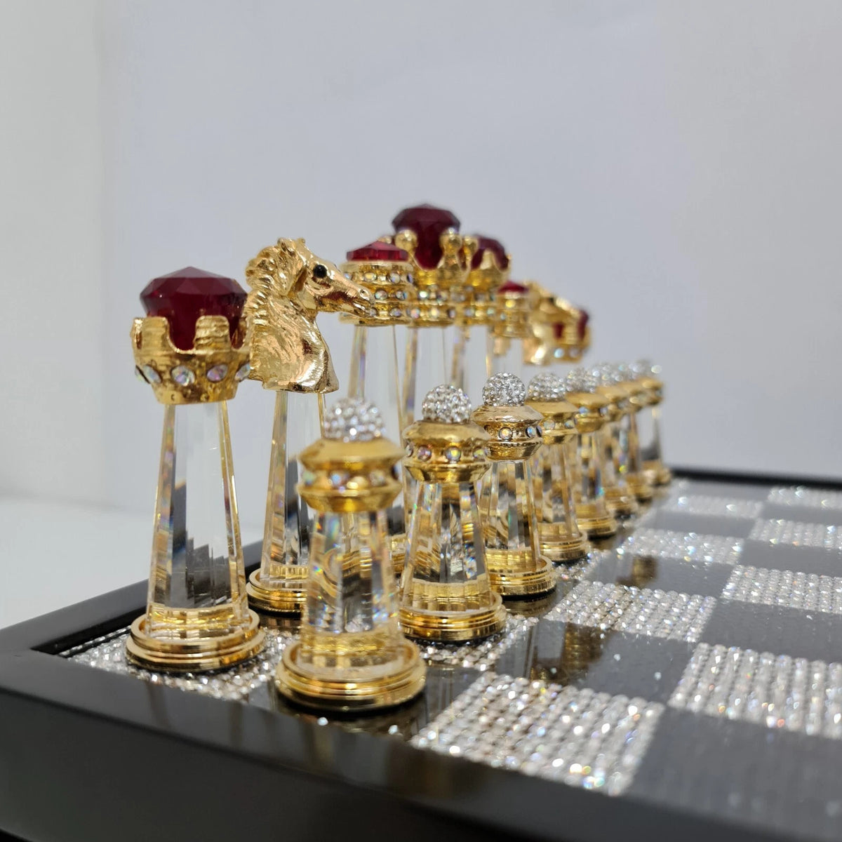 Detail of zircon stone accents on crystal chess pieces