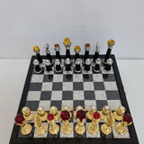 Chess set displayed with royal blue velvet storage box